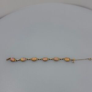 Chic Gold Bracelet with Pink Highlights